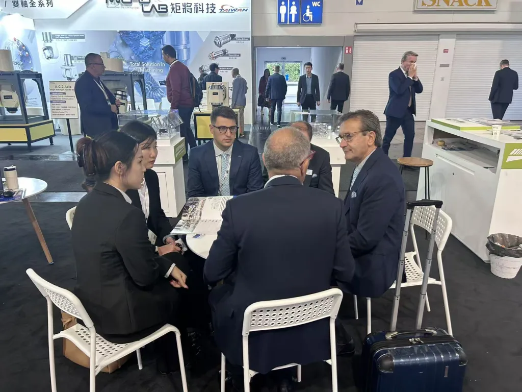 AFMING comunicate with customer at our booth of the EMO exhibition